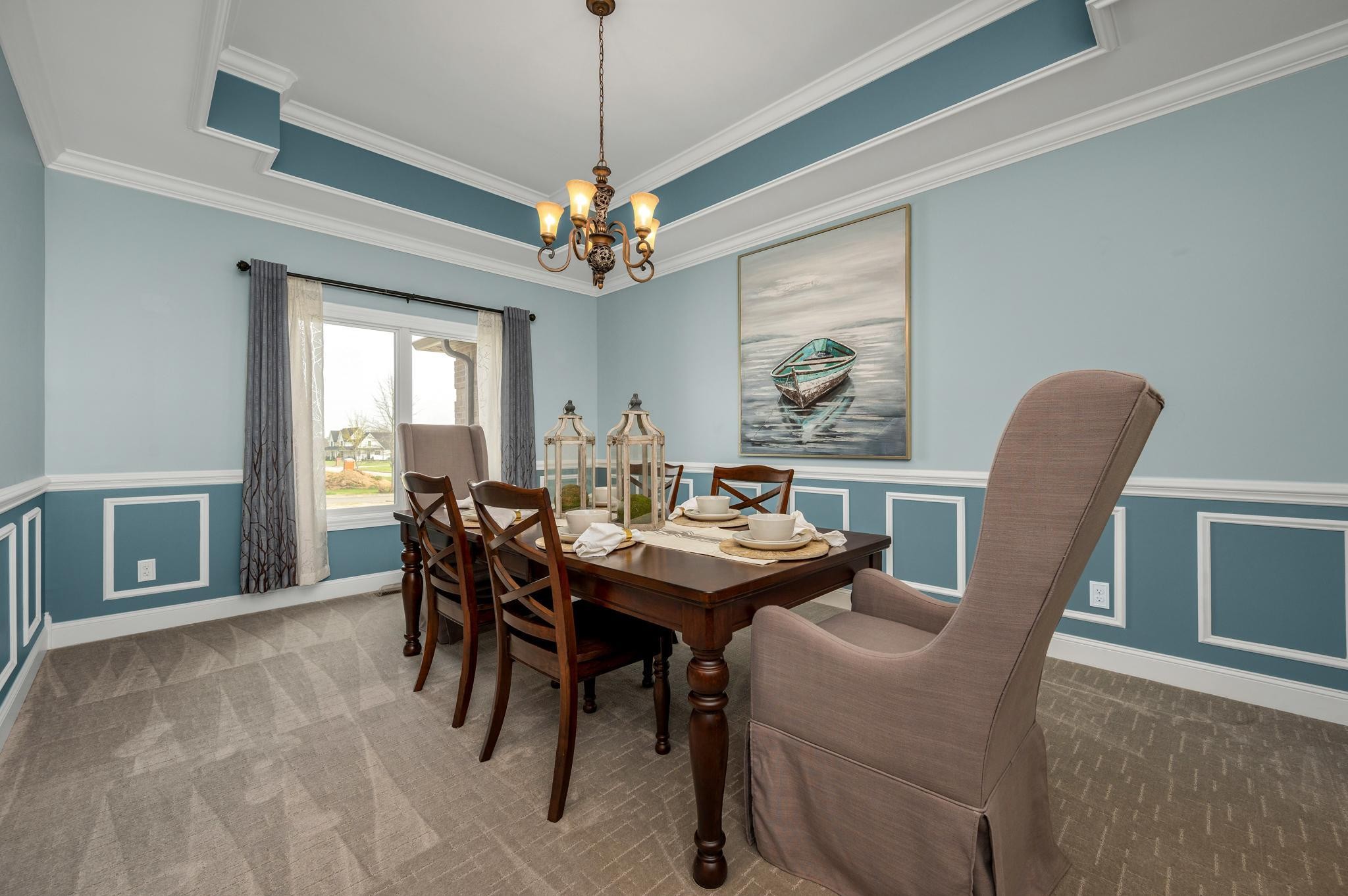 290 Cascade Drive Winchester, TN 37398 - Photo 39 of 68 a dining room with furniture a chandelier and wooden floor