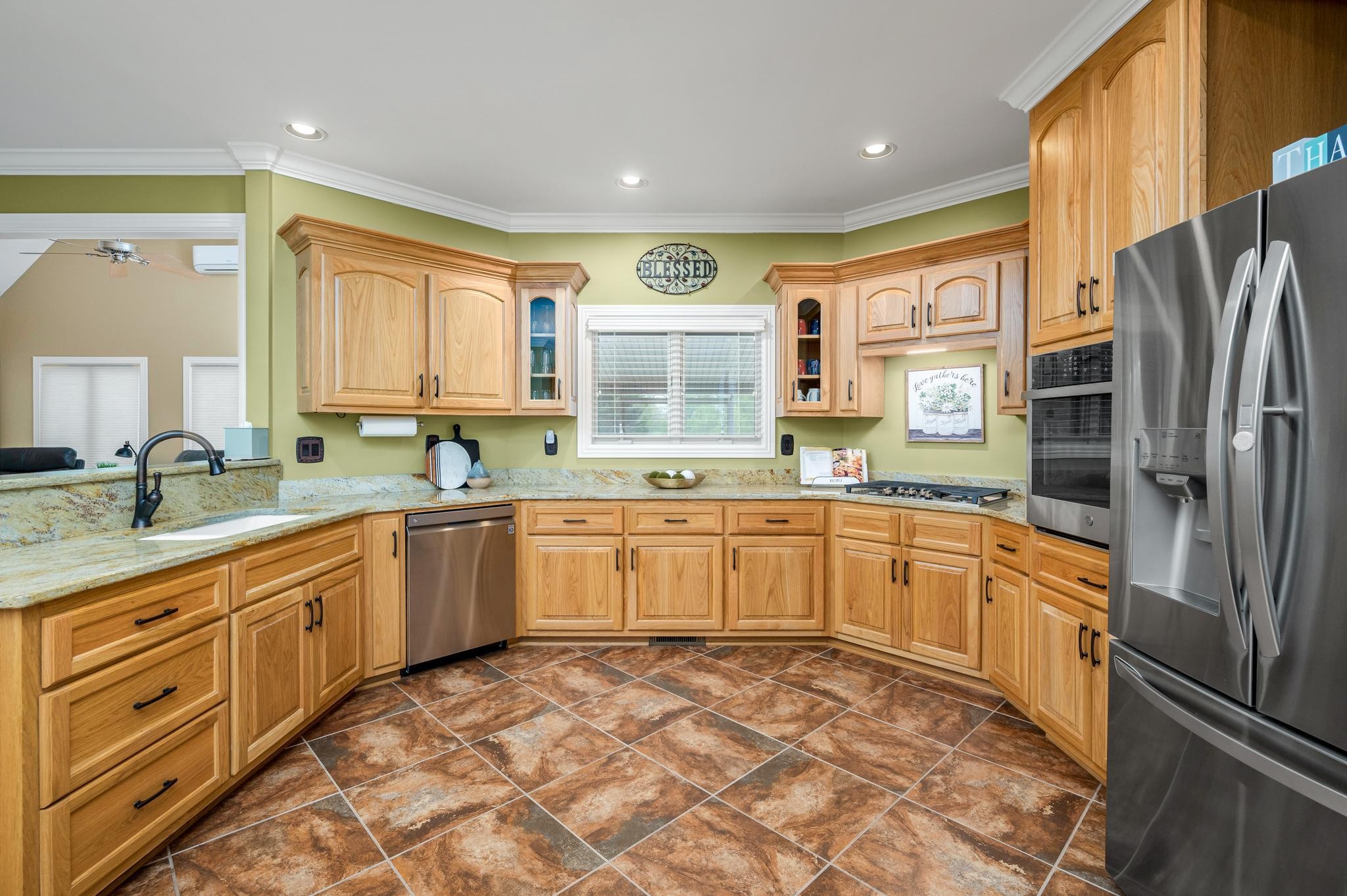 290 Cascade Drive Winchester, TN 37398 - Photo 42 of 68 a large kitchen with stainless steel appliances granite countertop a refrigerator and a sink