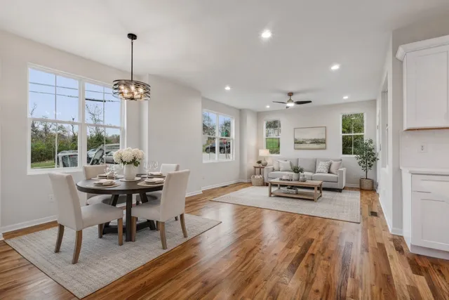 a living room with furniture and a table