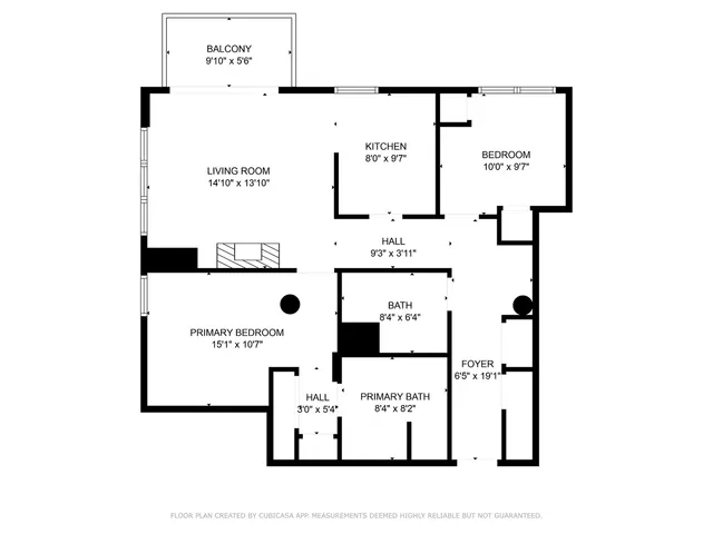 a dining room with furniture a rug and a large window