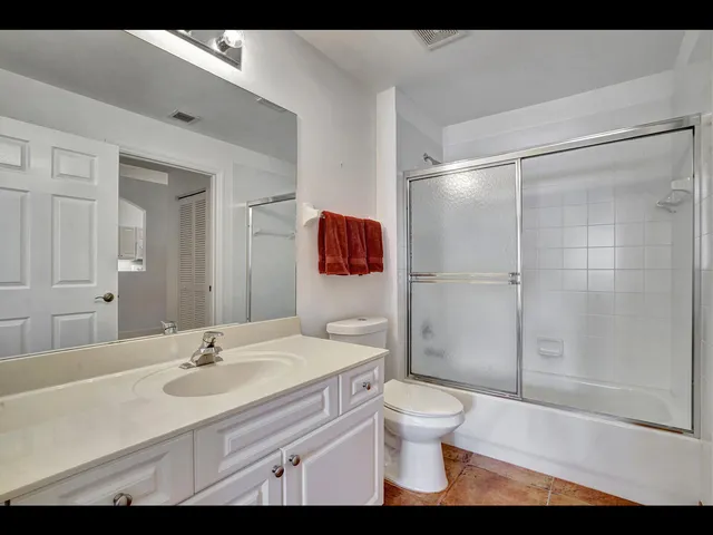 a patio with a yard table and chairs