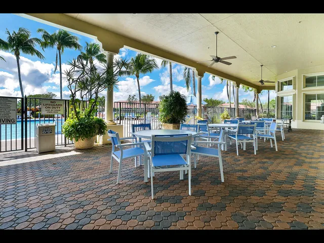 a view of a park with swings and slides