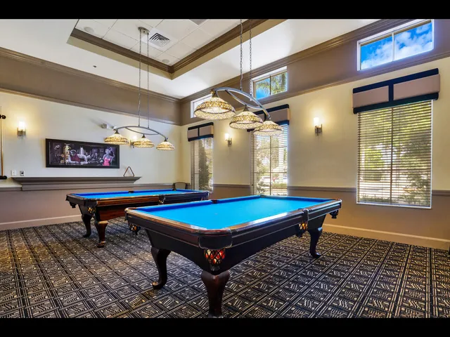 a view of swimming pool with a yard