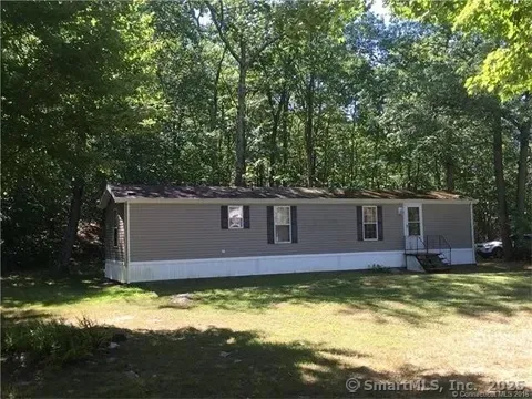 a view of a house with swimming pool