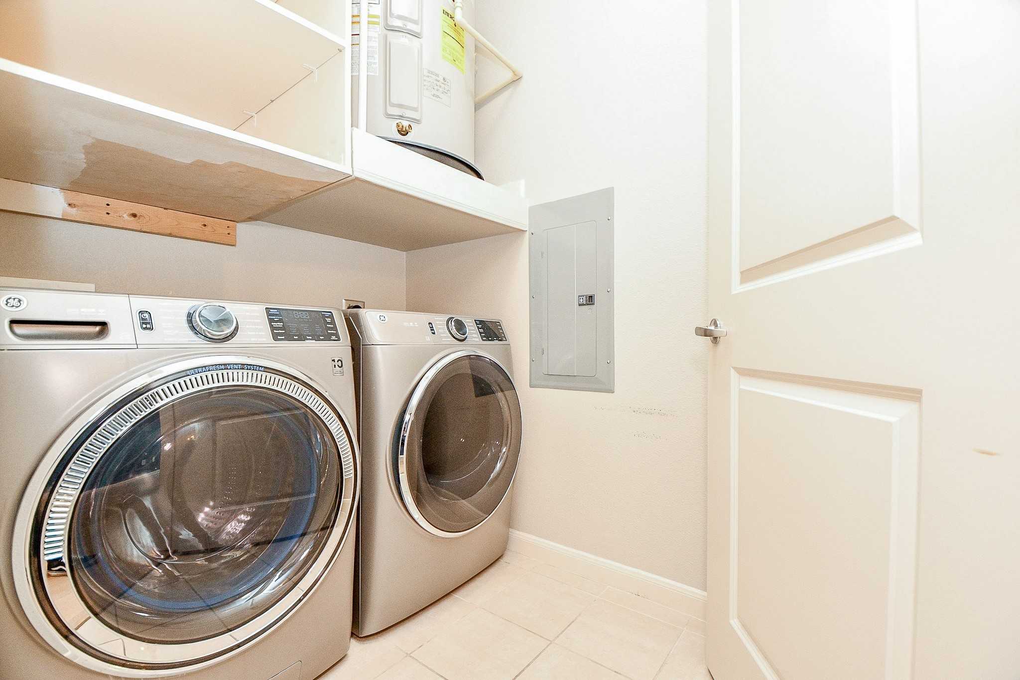 505 Jackson Hill Street, Unit 307 Houston, TX 77007 - Photo 18 of 30 a utility room with dryer and washer