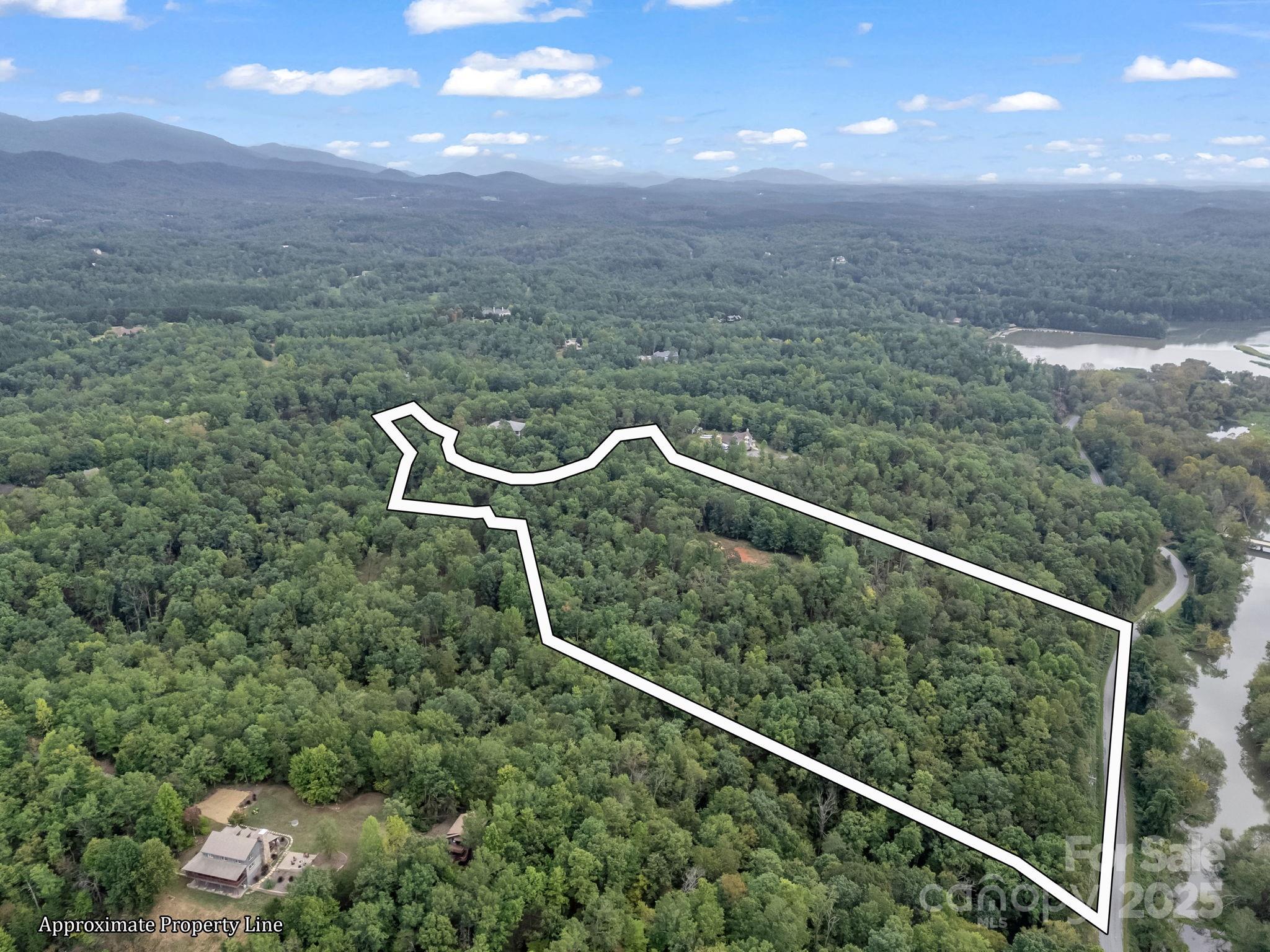 Tbd North Highland Road, Unit 6 Mill Spring, NC 28756 - Photo 25 of 37 a view of a balcony with an outdoor space