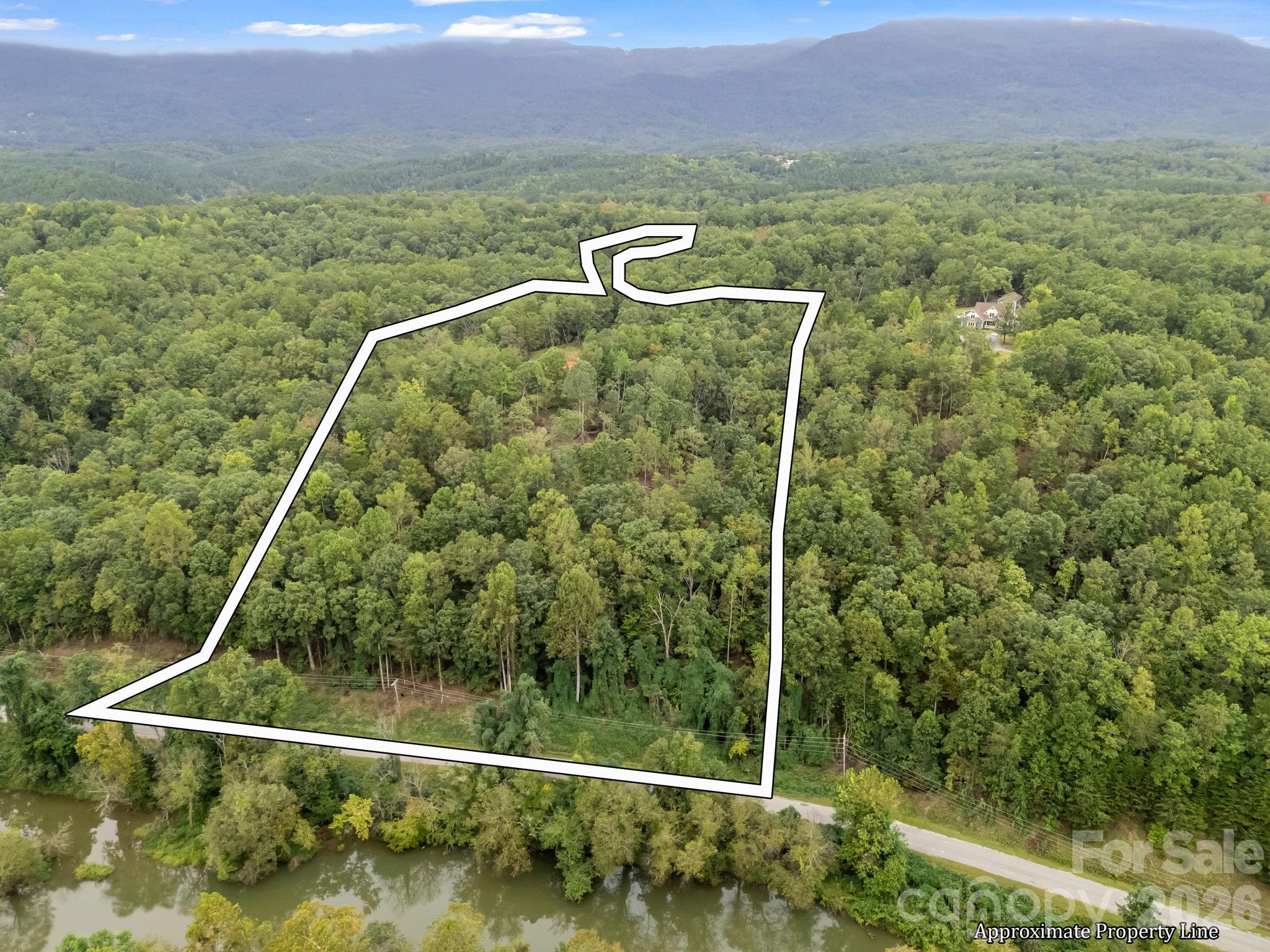 Tbd North Highland Road, Unit 6 Mill Spring, NC 28756 - Photo 4 of 37 a view of a tennis court