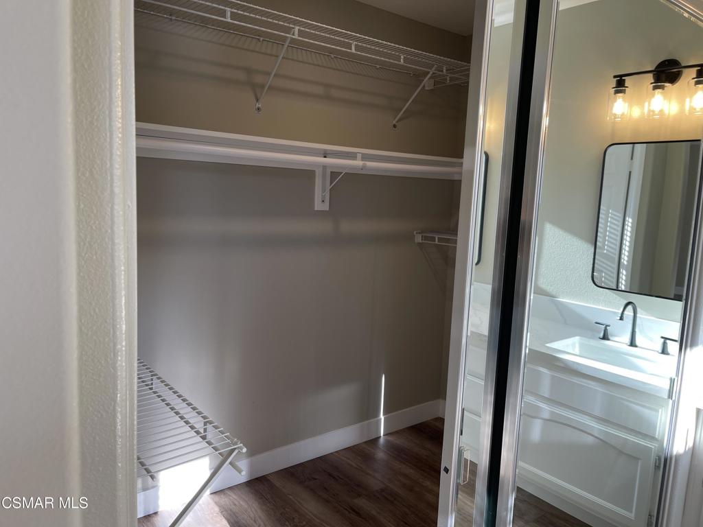 429 Dante Way Oak Park, CA 91377 - Photo 24 of 37 a bathroom with a sink and a mirror