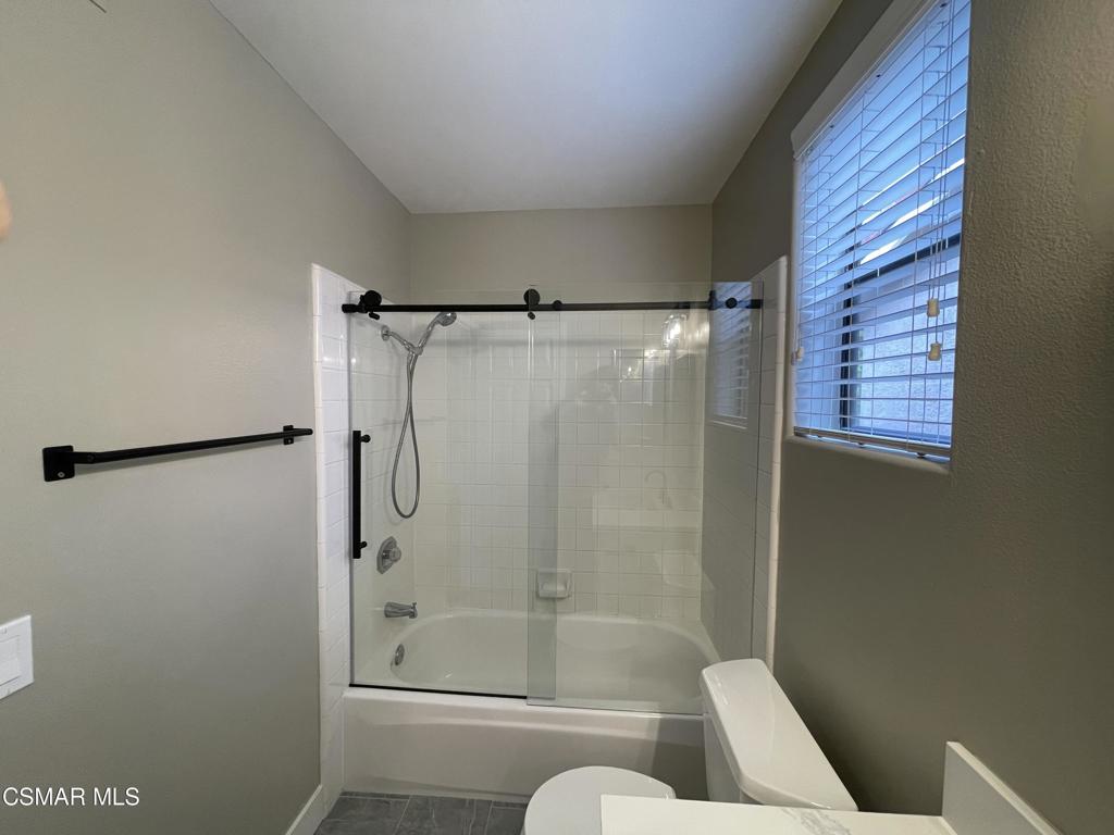 429 Dante Way Oak Park, CA 91377 - Photo 32 of 37 a bathroom with a shower and a toilet