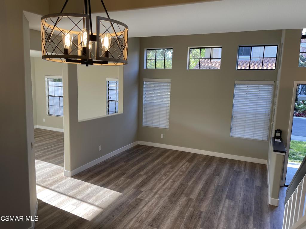 429 Dante Way Oak Park, CA 91377 - Photo 8 of 37 a view of a livingroom with wooden floor and chandelier