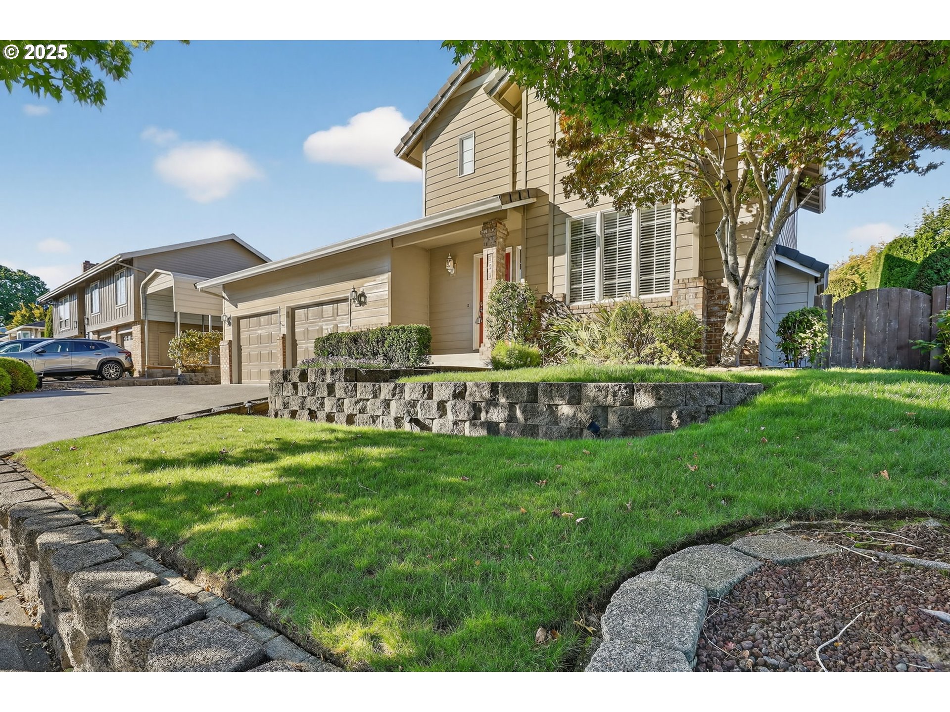 535 Northeast 24th Street Gresham, OR 97030 - Photo 6 of 41 a front view of a house with a garden