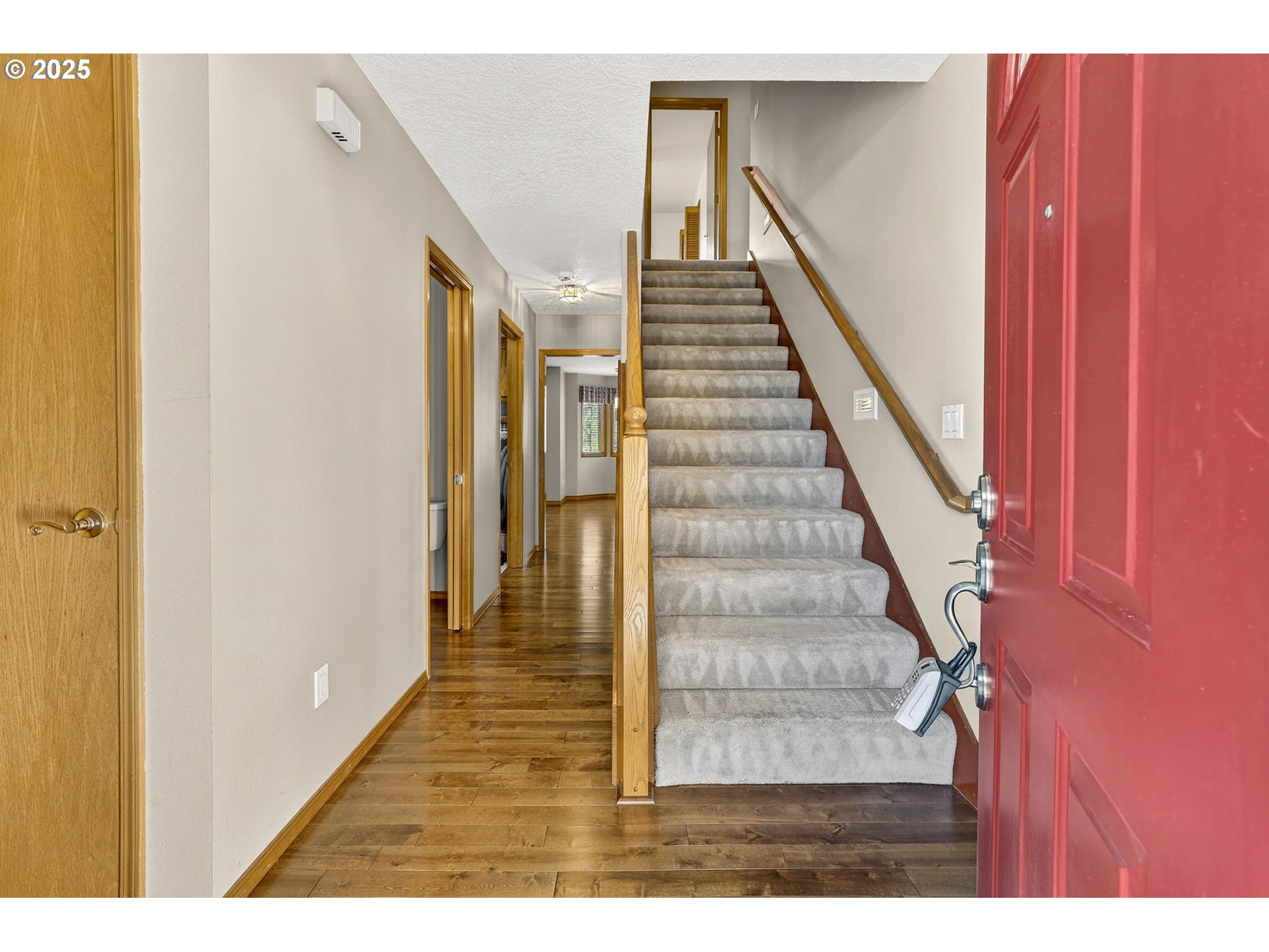 535 Northeast 24th Street Gresham, OR 97030 - Photo 8 of 41 a view of entryway and hall with wooden floor