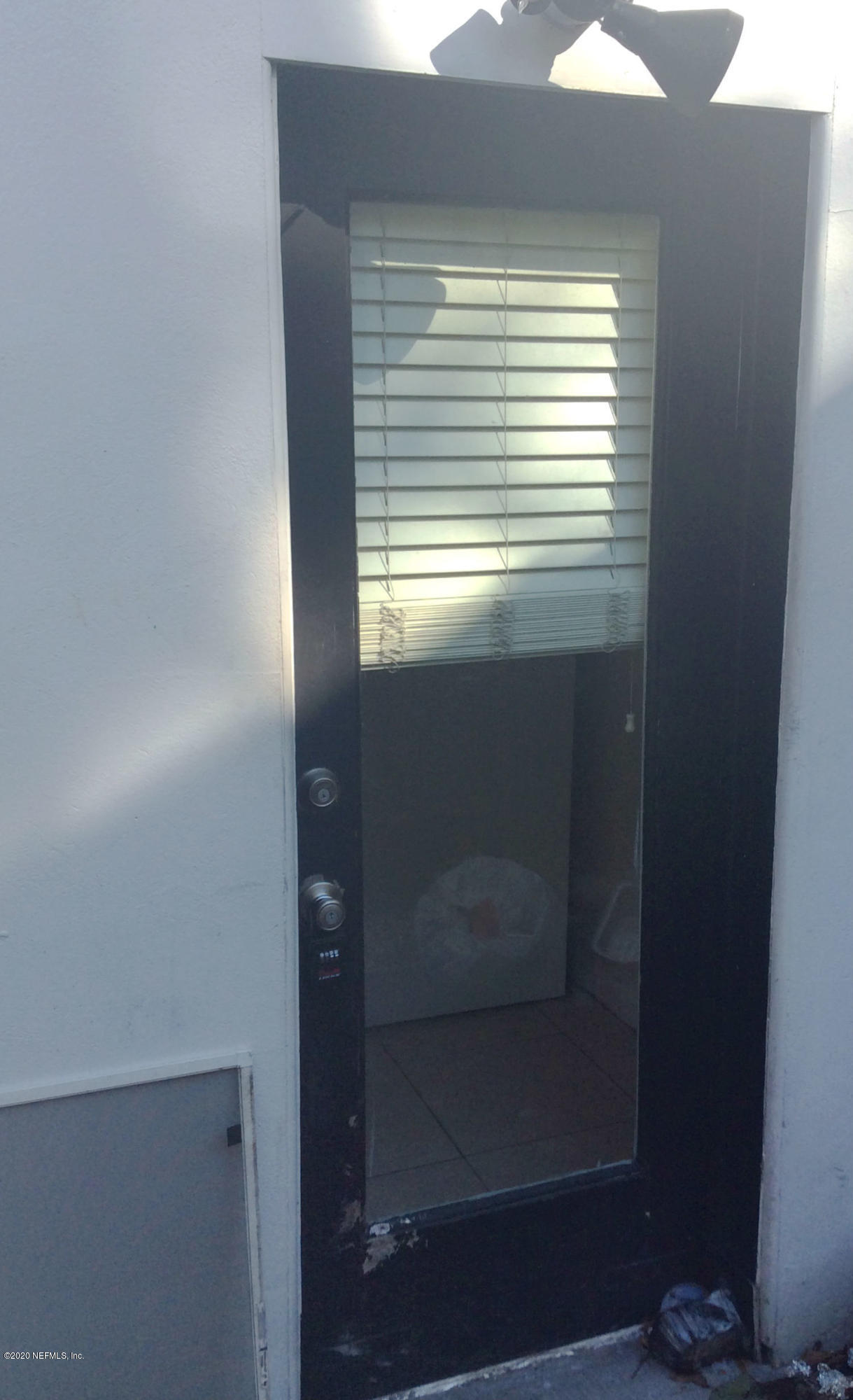 9 Sylvan Drive, Unit B St. Augustine, FL 32084 - Photo 2 of 10 a bathroom with a window