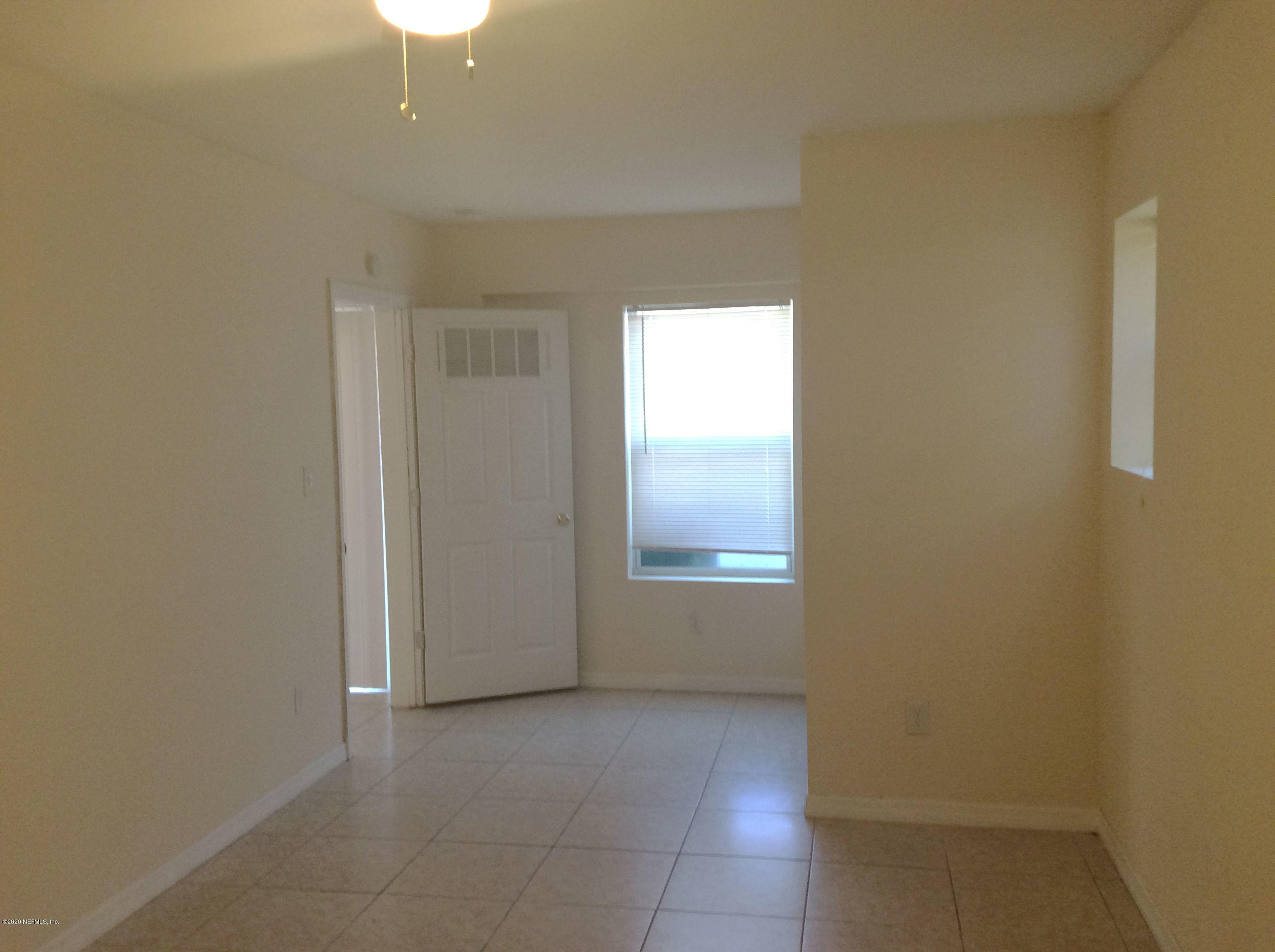 9 Sylvan Drive, Unit B St. Augustine, FL 32084 - Photo 7 of 10 an empty room with windows