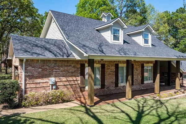a view of house with a outdoor space