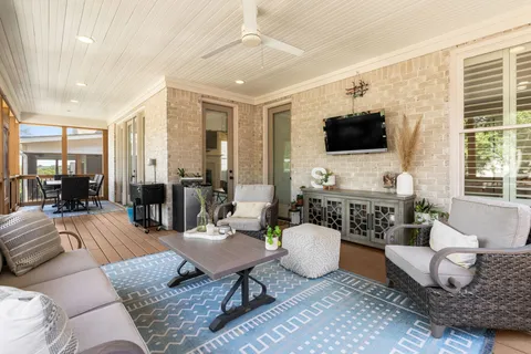 a outdoor living space with furniture and city view