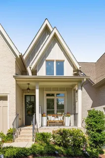 front view of a house with an outdoor space