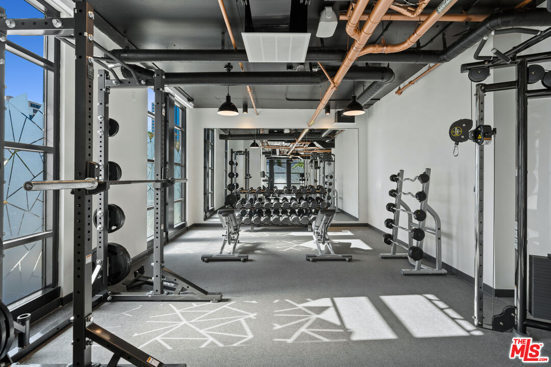 250 East Broadway, Unit 803 Long Beach, CA 90802 - Photo 15 of 44 a view of a room with gym equipment