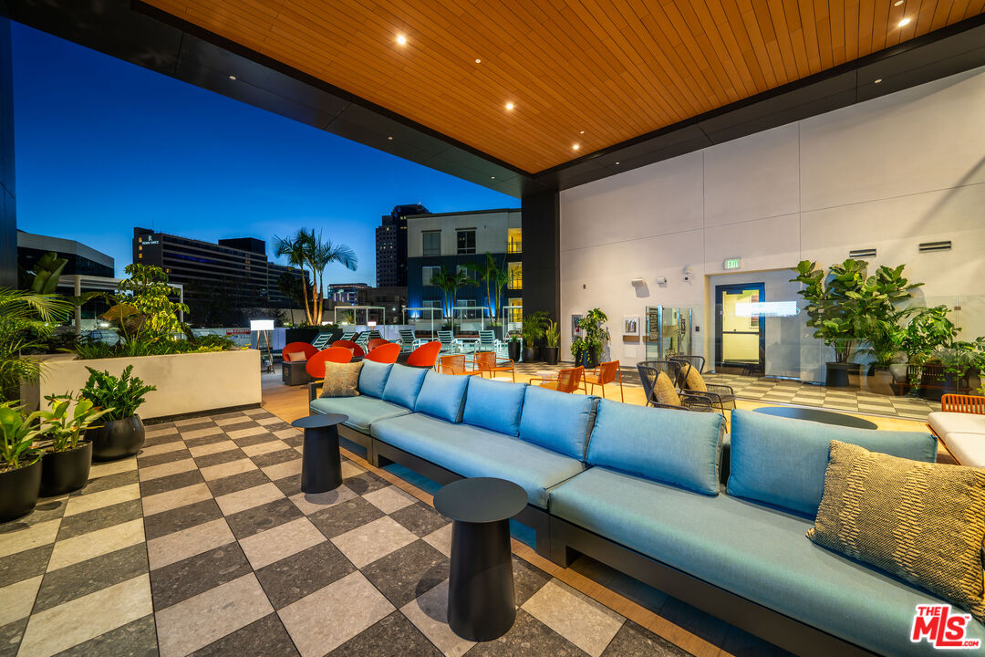 250 East Broadway, Unit 803 Long Beach, CA 90802 - Photo 5 of 44 a outdoor living space with furniture and a flat screen tv