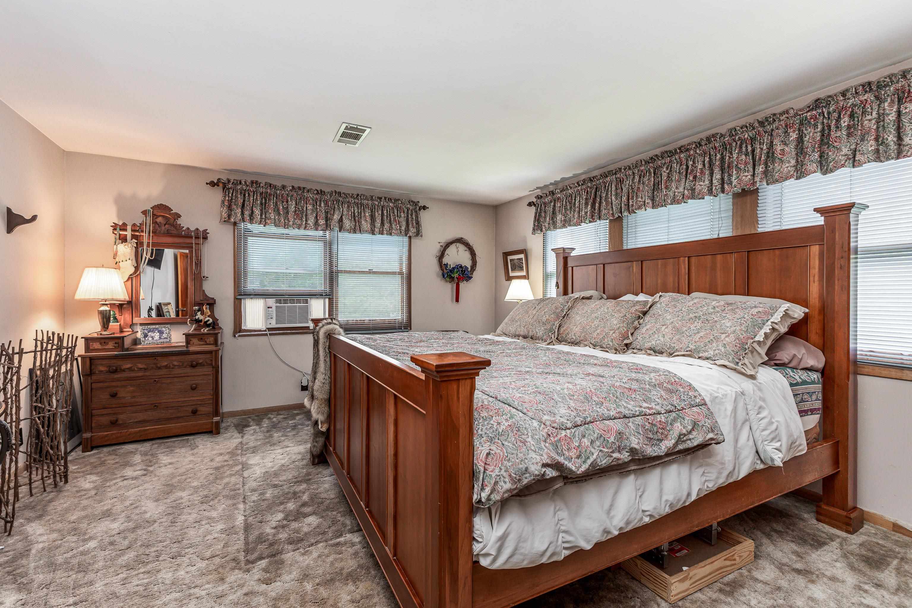 103 4th Street Galena, IL 61036 - Photo 14 of 64 a bed room with a bed and furniture