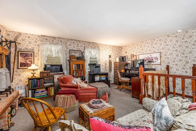 a bedroom with a bed and dresser