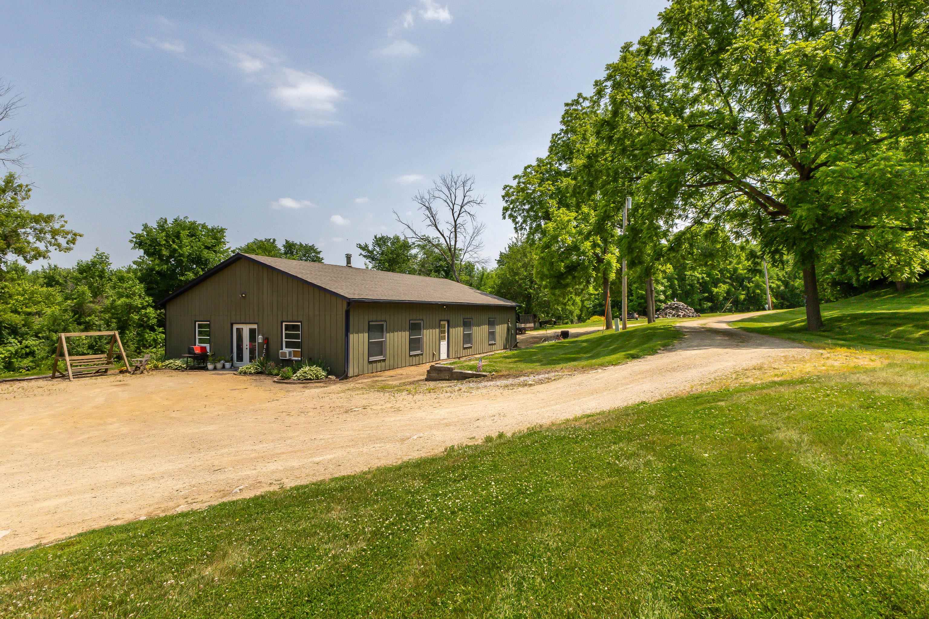 103 4th Street Galena, IL 61036 - Photo 2 of 64 a front view of house with yard and trees