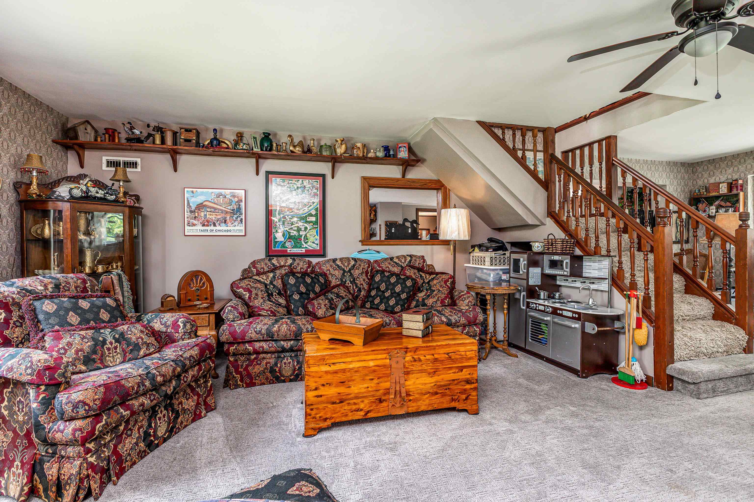103 4th Street Galena, IL 61036 - Photo 27 of 64 a living room with furniture and a flat screen tv