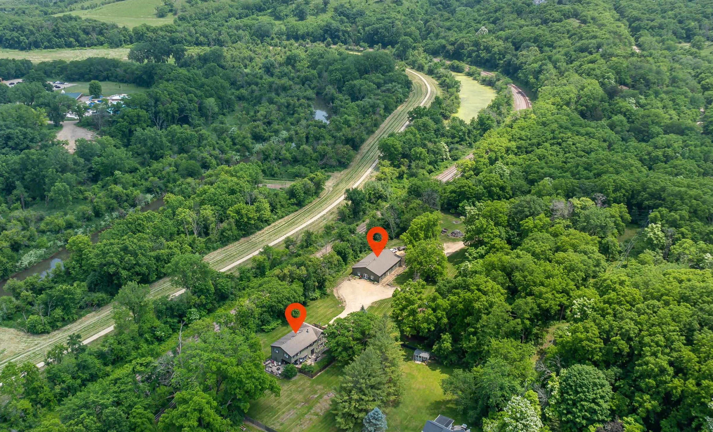 103 4th Street Galena, IL 61036 - Photo 3 of 64 an aerial view of residential houses with outdoor space and trees