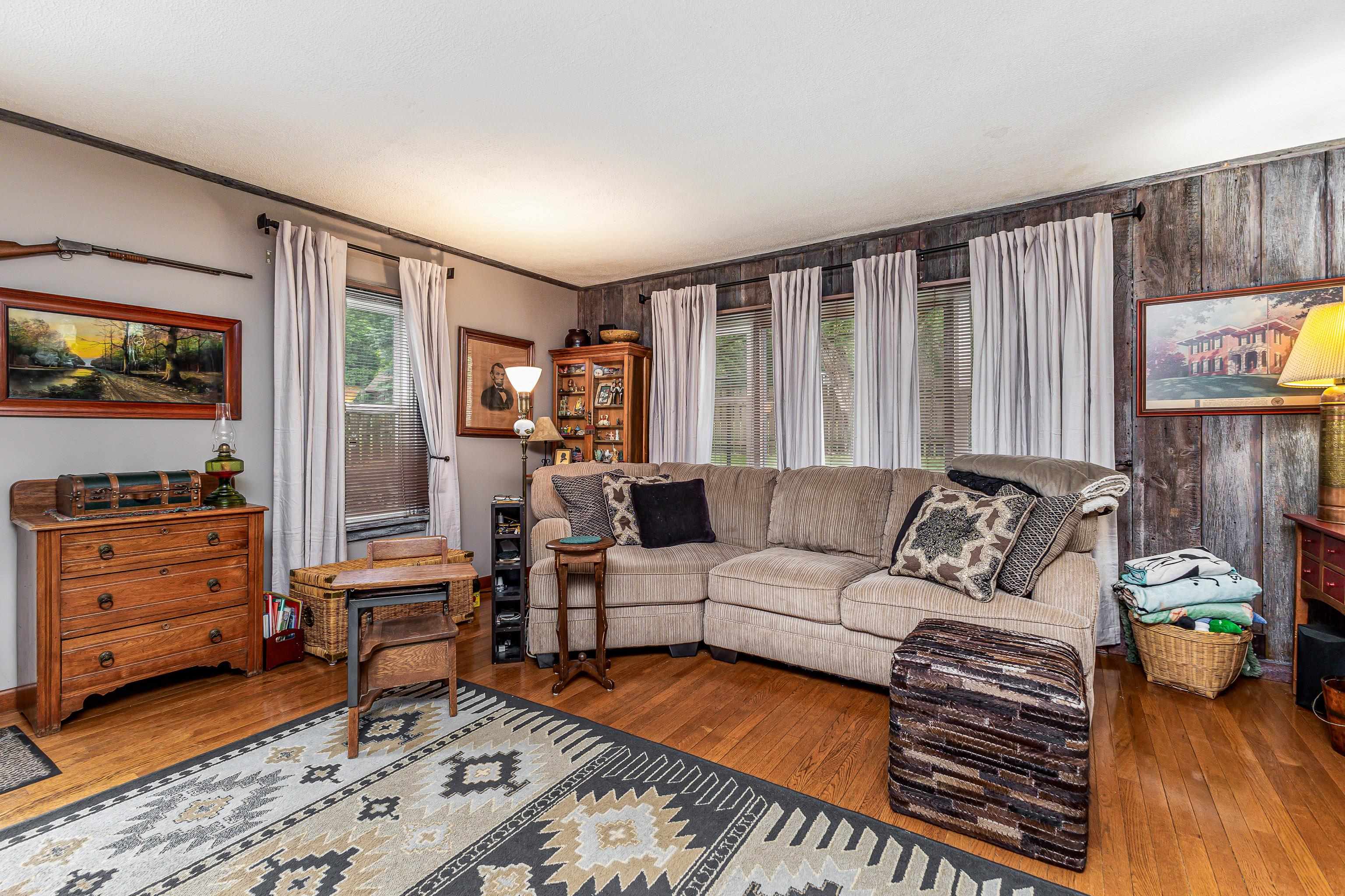 103 4th Street Galena, IL 61036 - Photo 37 of 64 a living room with furniture and a flat screen tv