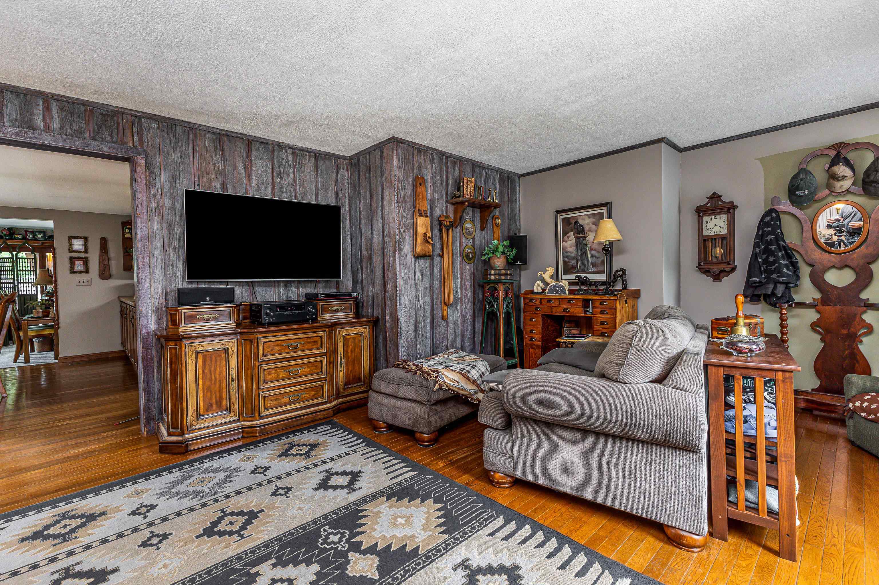 103 4th Street Galena, IL 61036 - Photo 38 of 64 a living room with furniture and a flat screen tv