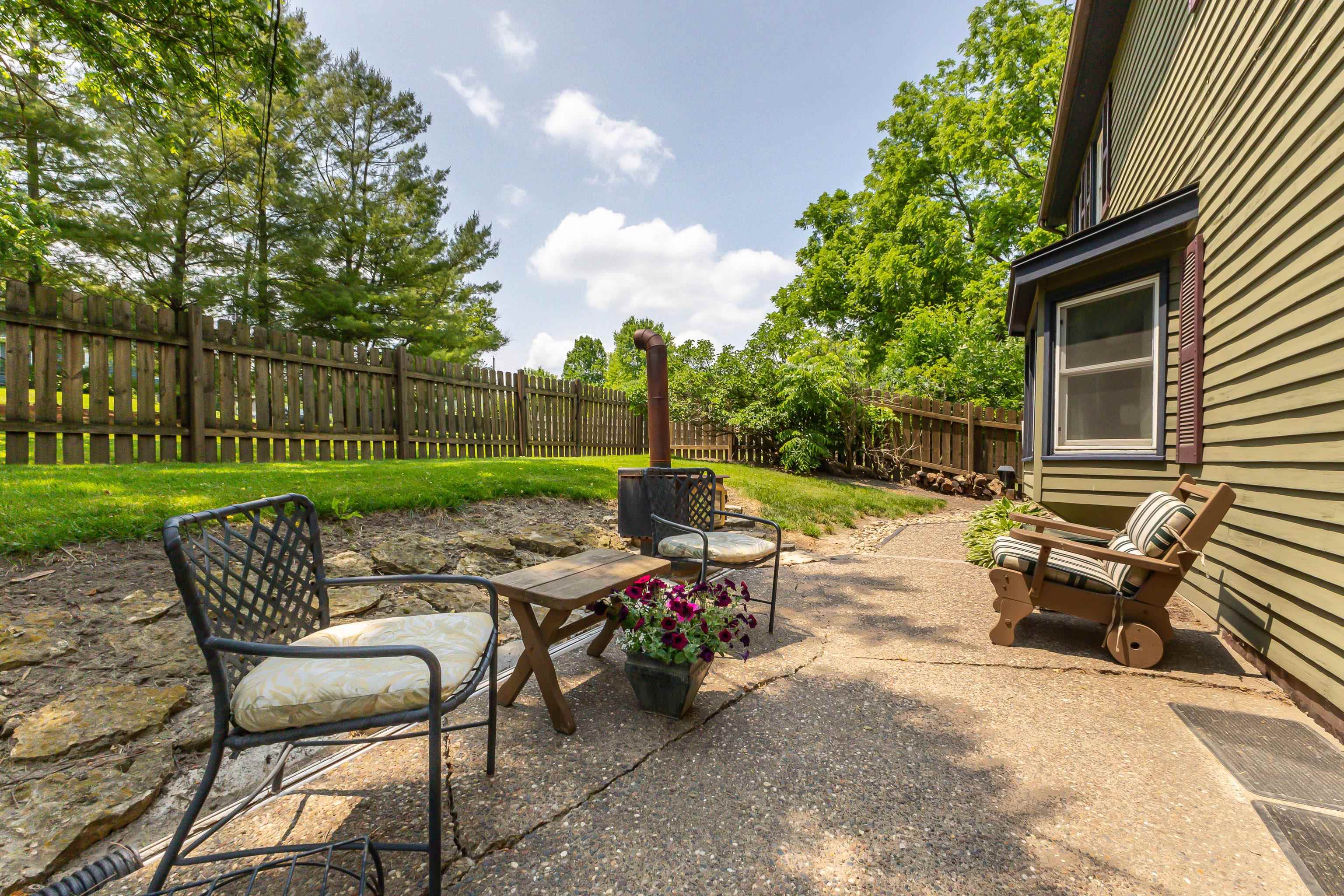 103 4th Street Galena, IL 61036 - Photo 39 of 64 a view of a patio with a table and chairs