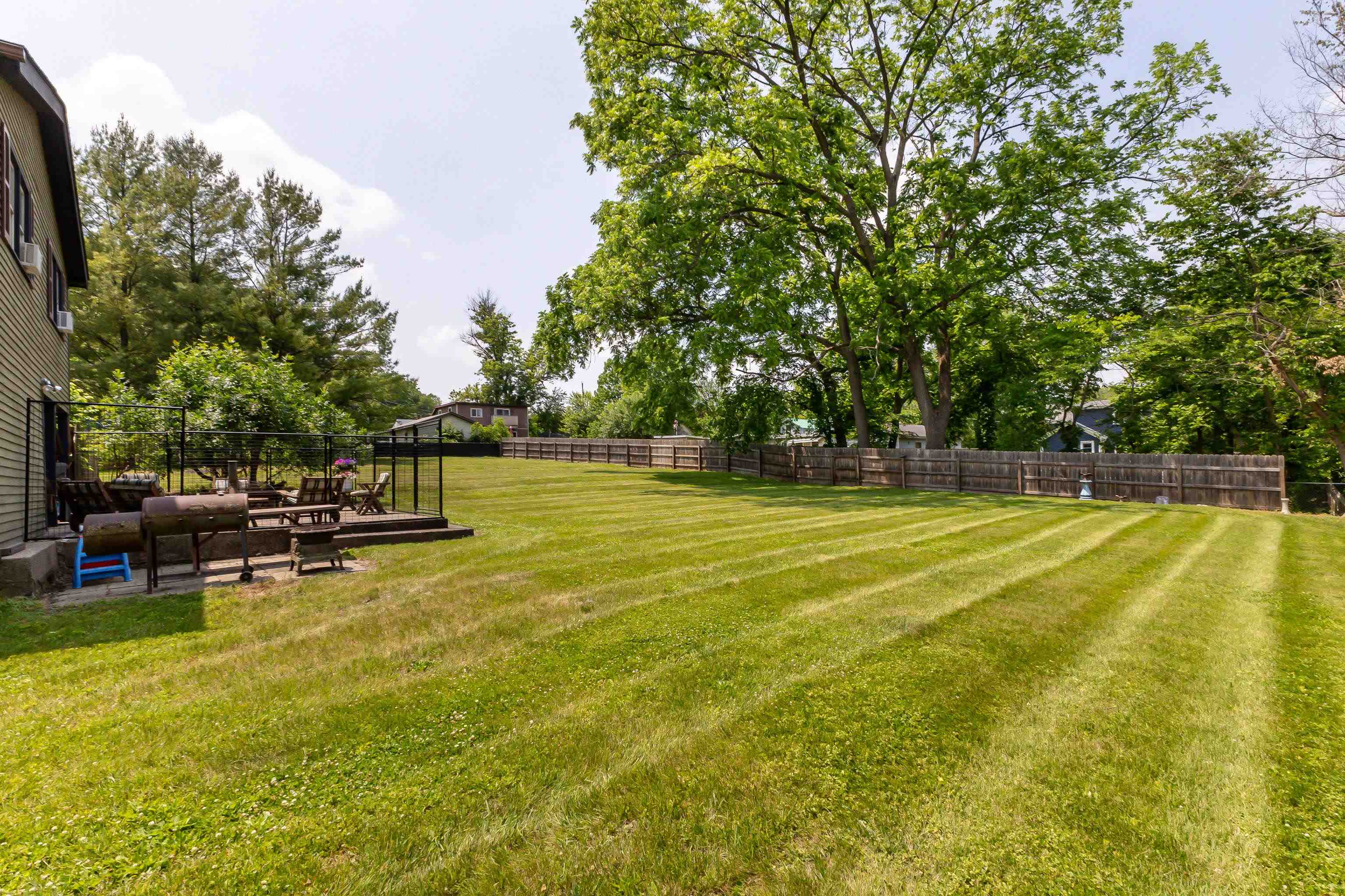 103 4th Street Galena, IL 61036 - Photo 43 of 64 a view of a swimming pool with a patio and a yard