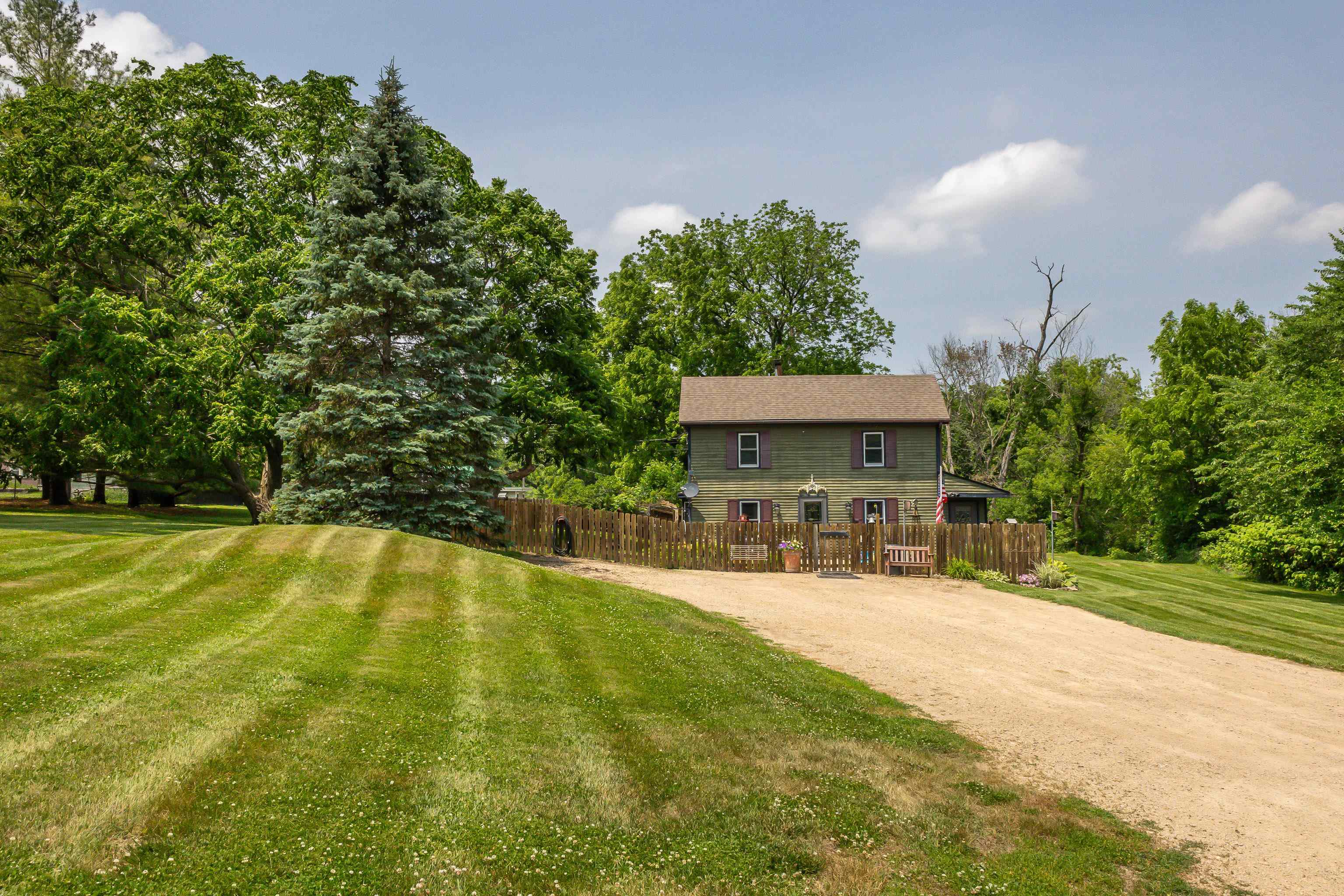 103 4th Street Galena, IL 61036 - Photo 6 of 64 a view of swimming pool with lawn chairs and plants
