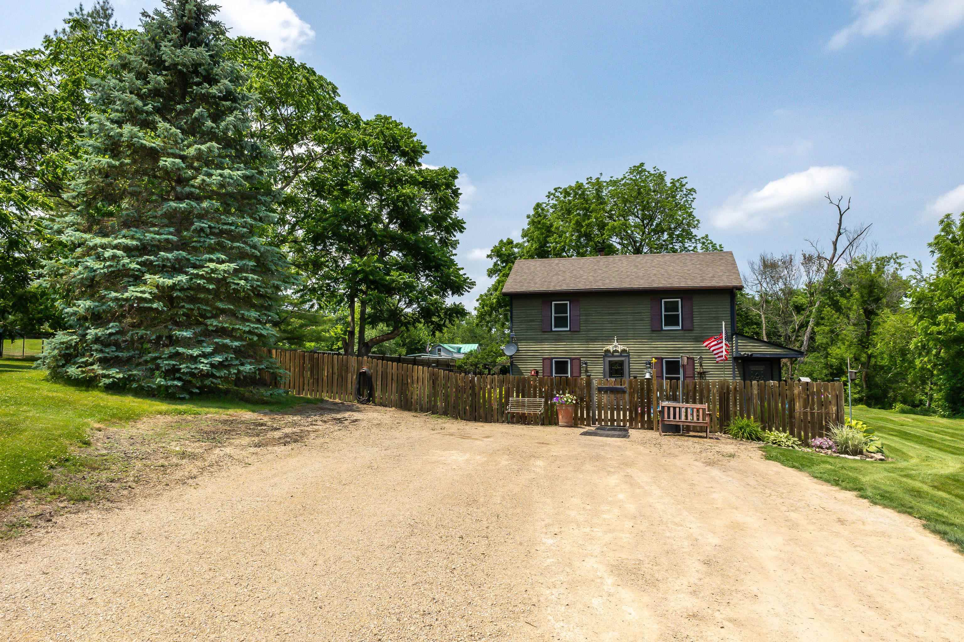 103 4th Street Galena, IL 61036 - Photo 64 of 64 a view of a house with yard and sitting area