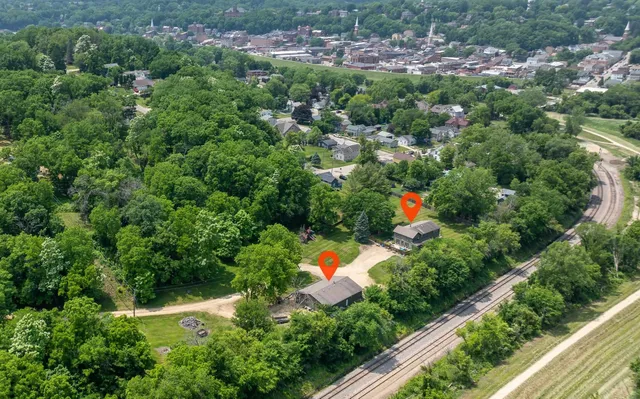 a bed room with bed and a flat screen tv