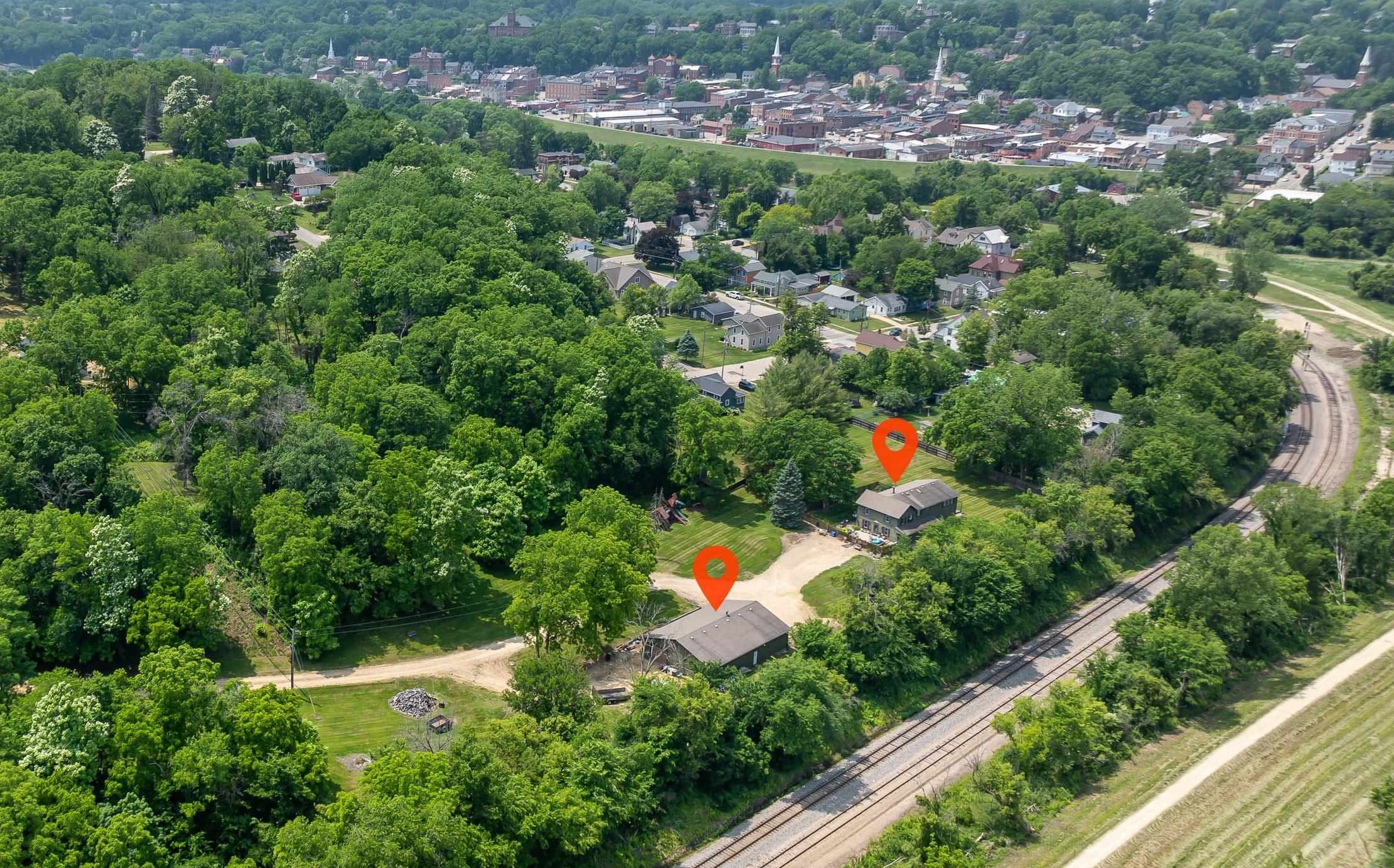 103 4th Street Galena, IL 61036 - Photo 9 of 64 an aerial view of residential house with outdoor space and trees all around
