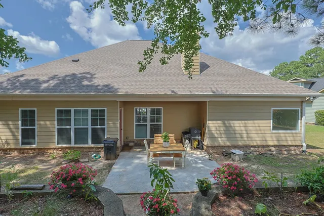 a house view with a garden space