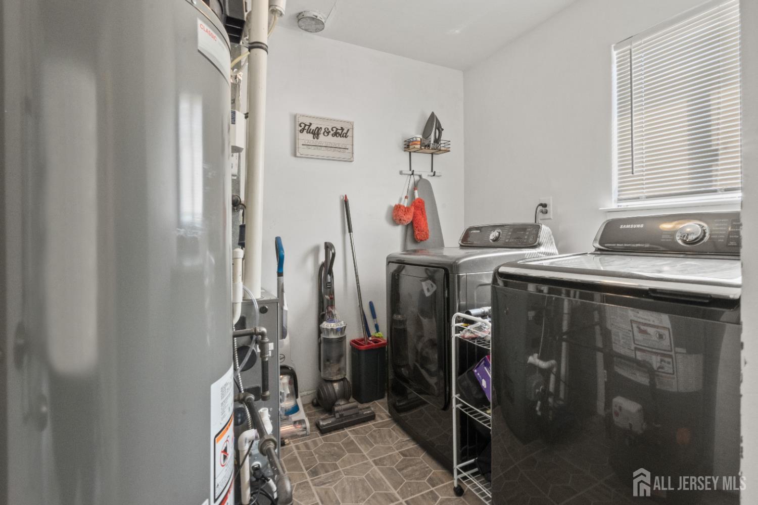 3 Mendon Drive Howell, NJ 07731 - Photo 20 of 23 a utility room with dryer washer and other items