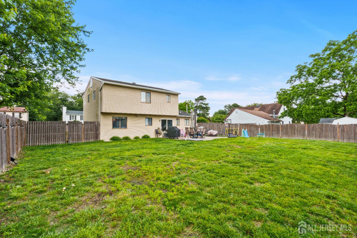 3 Mendon Drive Howell, NJ 07731 - Photo 22 of 23 a view of a house with backyard and garden