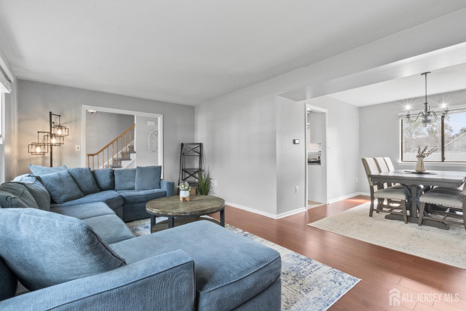 3 Mendon Drive Howell, NJ 07731 - Photo 7 of 23 a living room with furniture and wooden floor