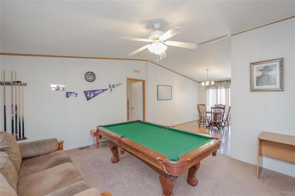 4260 Couch Road Ponder, TX 76259 - Photo 19 of 25 a room with pool table and windows