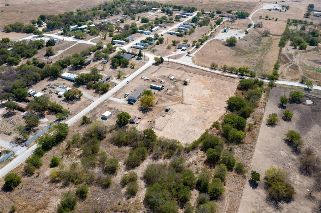 4260 Couch Road Ponder, TX 76259 - Photo 21 of 25 an aerial view of residential houses with outdoor space