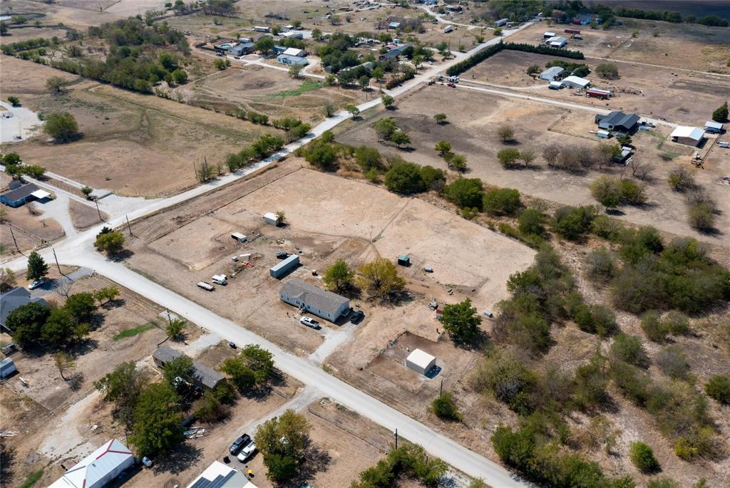 4260 Couch Road Ponder, TX 76259 - Photo 23 of 25 an aerial view of a house with a yard
