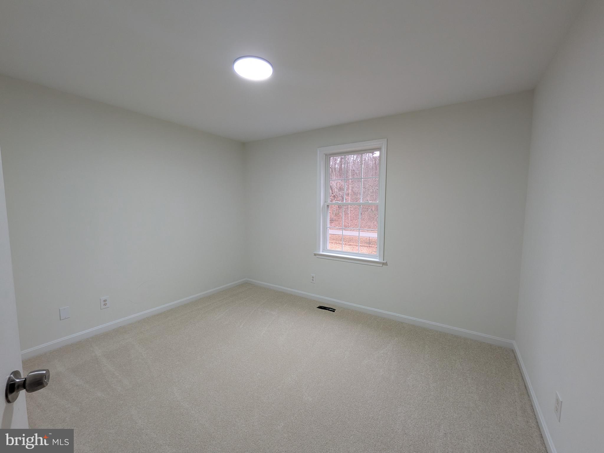 144 Quarry Road Stafford, VA 22554 - Photo 20 of 35 an empty room with a window