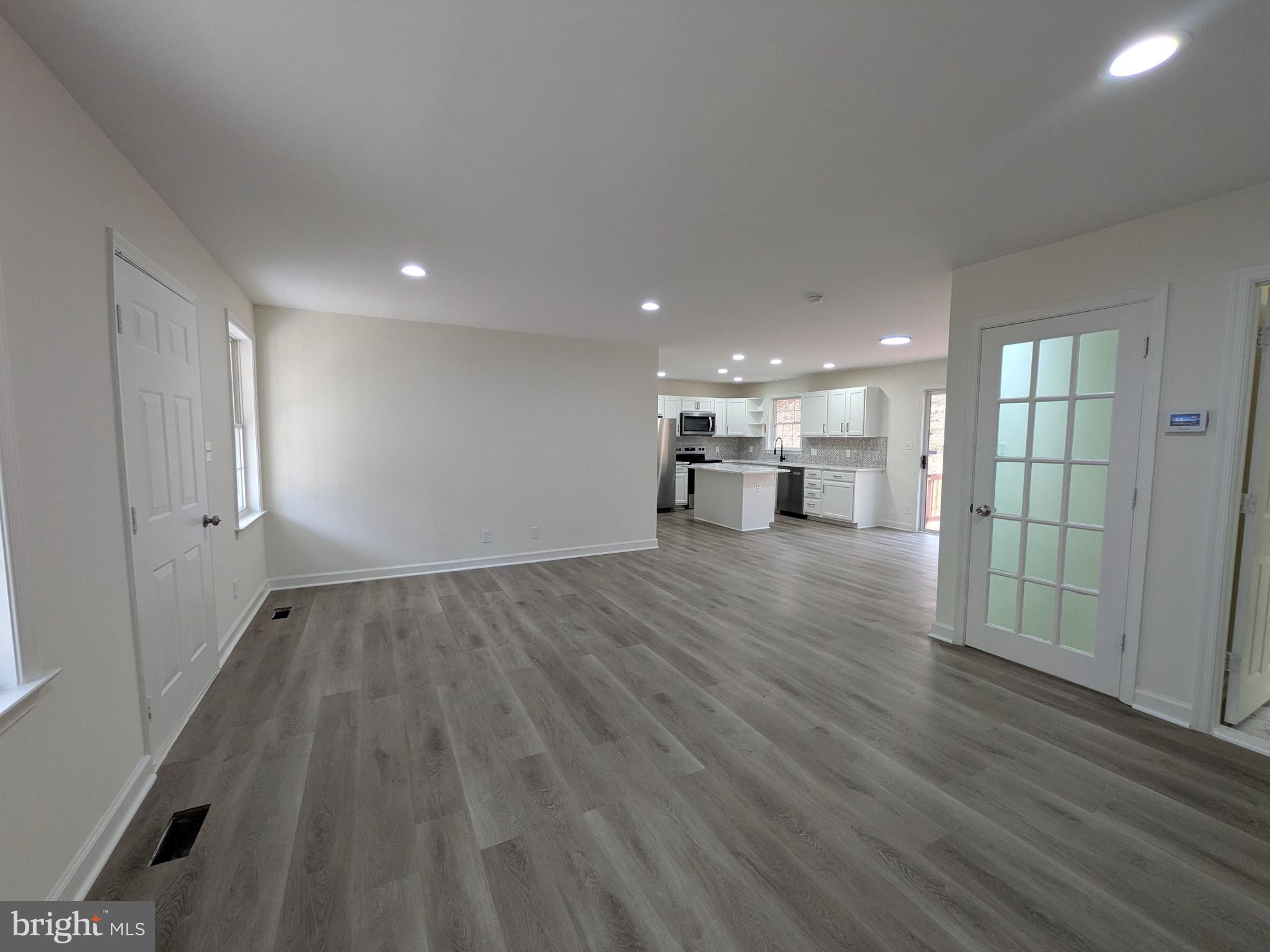 144 Quarry Road Stafford, VA 22554 - Photo 3 of 35 a view of kitchen with furniture and wooden floor