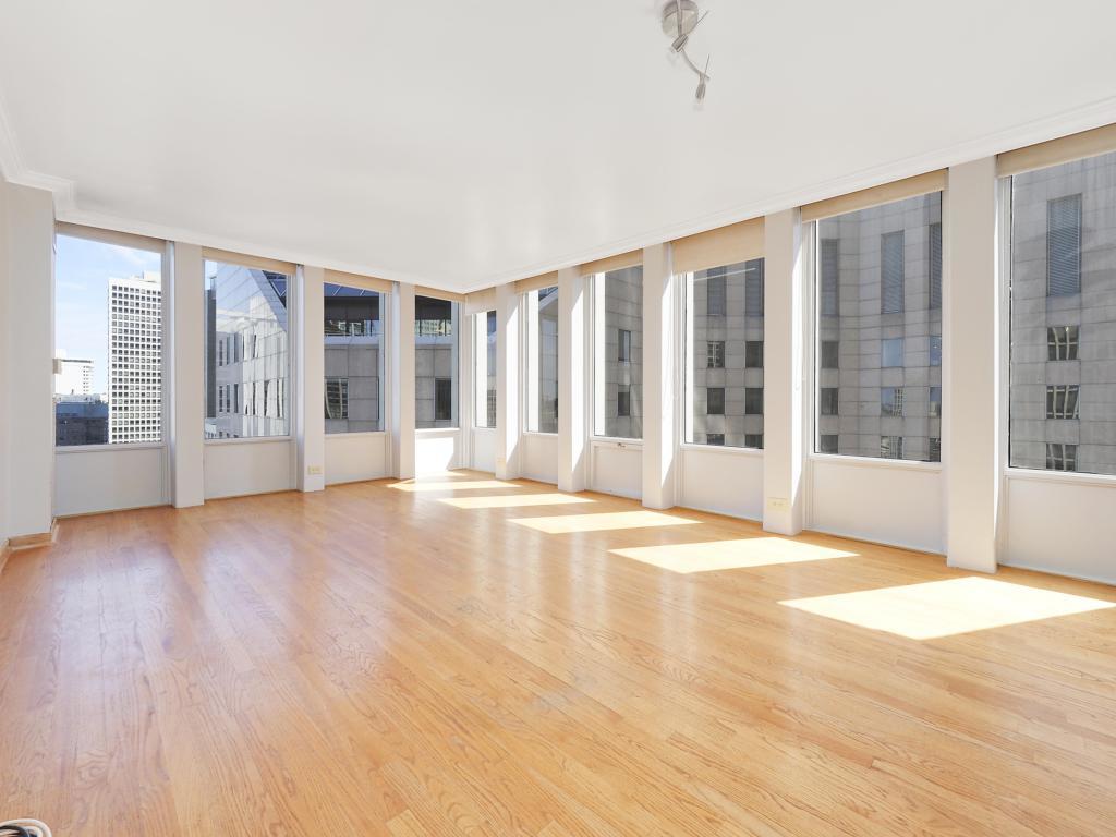 100 East Walton Street, Unit 27B Chicago, IL 60611 - Photo 6 of 18 a view of an empty room with glass door