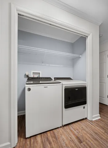 a utility room with washer and dryer