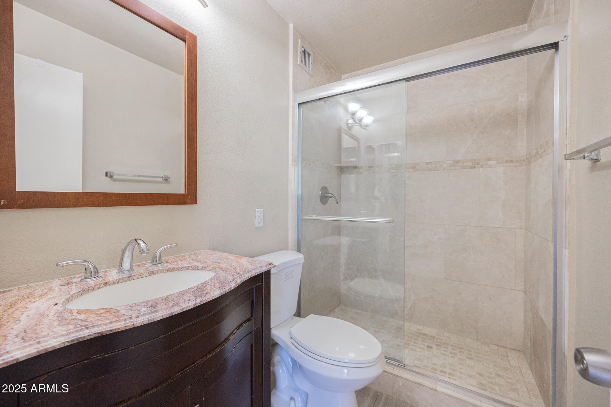 2724 South Azalea Drive Tempe, AZ 85282 - Photo 14 of 25 a bathroom with a granite countertop sink toilet and shower