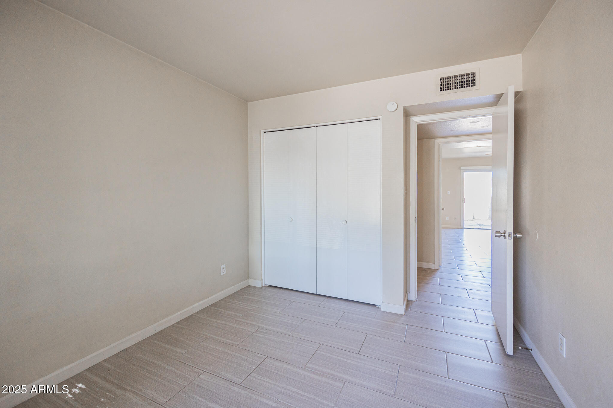 2724 South Azalea Drive Tempe, AZ 85282 - Photo 20 of 25 a view of a room with wooden floor