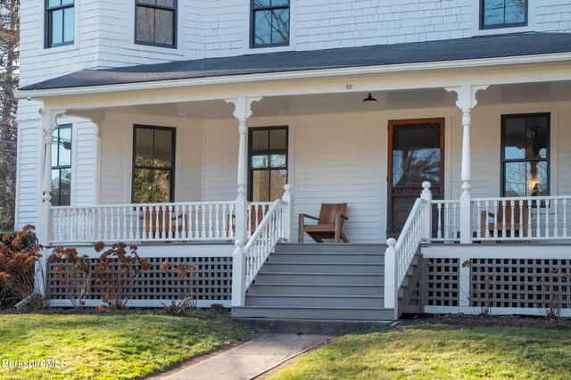 a view of a living room and dining room